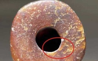 从神徽、砣痕与沁色，读懂良渚玉器真伪